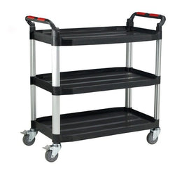 A three-tier utility cart with black plastic shelves, a silver metal frame, and gray caster wheels with red handle grips, shown on a white background.