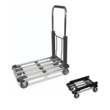 A folding utility dolly cart with a silver aluminum slatted base, black handle, and gray wheels, shown in both unfolded and folded positions on a white background.
